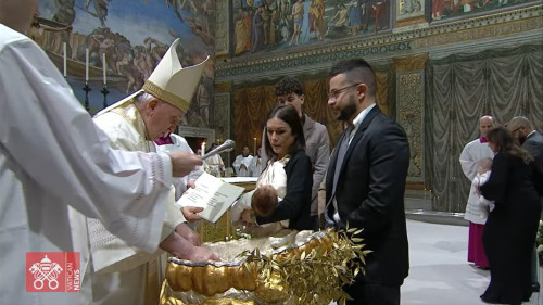 Pope Francis baptises 13 babies in the Sistine Chapel